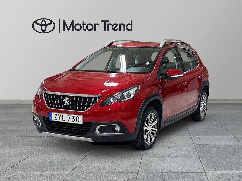 Mörkröd (röd) Begagnad 2018 Peugeot 2008 SUV | 129 000 kr (Marknadspris) - Bild 1/4