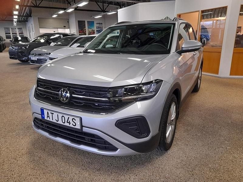 Silver (reflex silver metallic) Begagnad 2025 VW T-Cross Life SUV | 234 900 kr (Marknadspris) - Bild 1/4