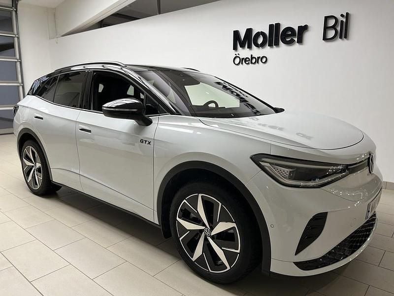 Glacier white metallic bl Begagnad 2024 VW ID.4 GTX SUV | 469 000 kr (Lite dyr) - Bild 1/4