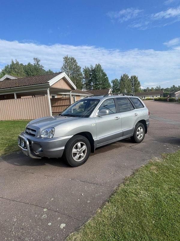 Silver Begagnad 2006 Hyundai Santa Fe SUV | 28 000 kr (Marknadspris) - Bild 1/4
