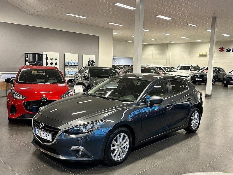 Grå Begagnad 2014 Mazda 3 Inclusive Halvkombi | 94 900 kr (Marknadspris) - Bild 1/4