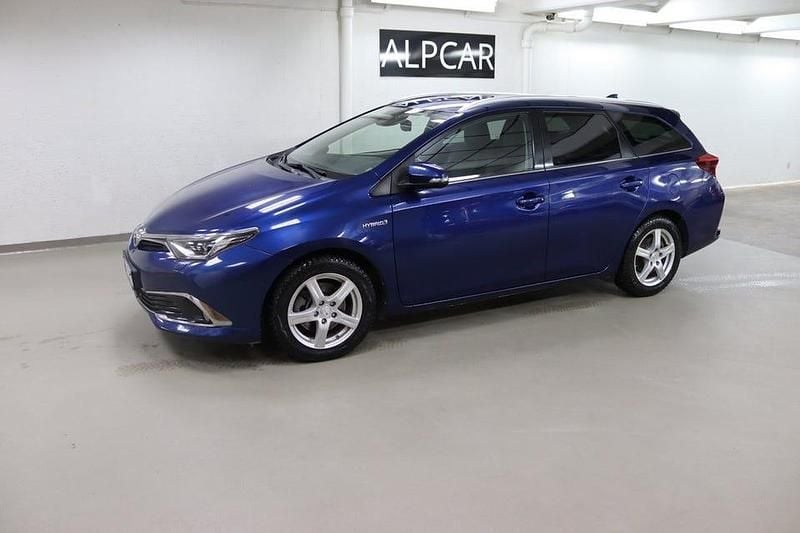 Blå Begagnad 2016 Toyota Auris Hybrid Executive Kombi | 159 900 kr (Marknadspris) - Bild 1/4