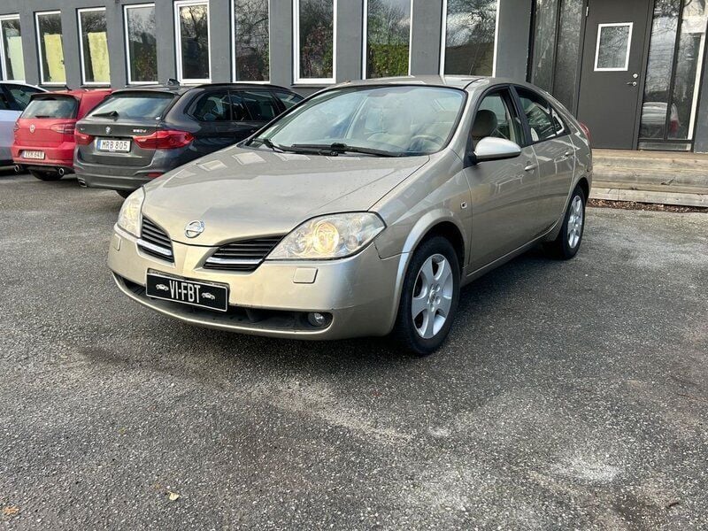 Ljusgul Begagnad 2002 Nissan Primera Halvkombi | 14 900 kr (Marknadspris) - Bild 1/4