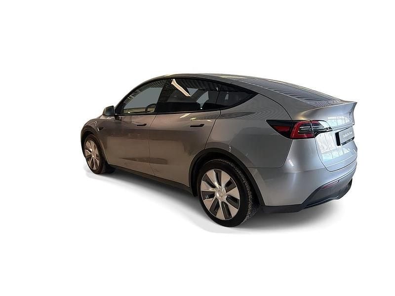 Begagnad Tesla Model Y Long Range AWD 378 kW (514 HK) 2023 Grå SUV