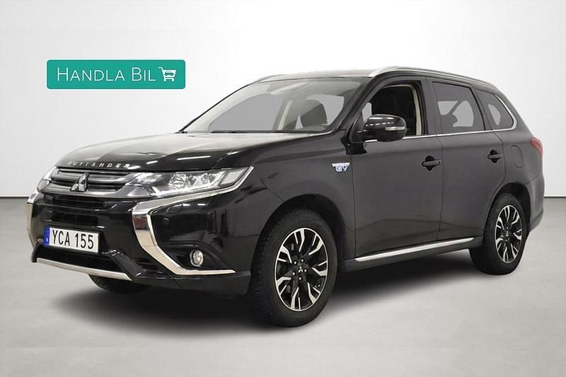 Svart Begagnad 2016 Mitsubishi Outlander P-HEV | 159 900 kr (Marknadspris) - Bild 1/4