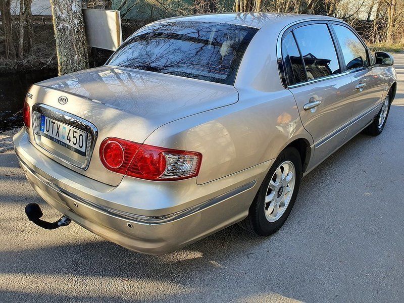 Киа опирус 2004
