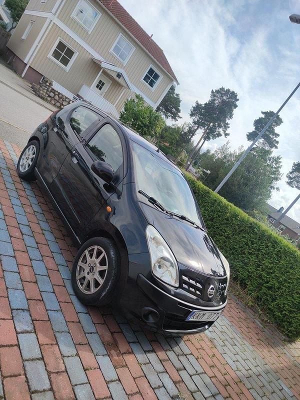 Svart Begagnad 2010 Nissan Pixo Halvkombi | 45 000 kr - Bild 1/4