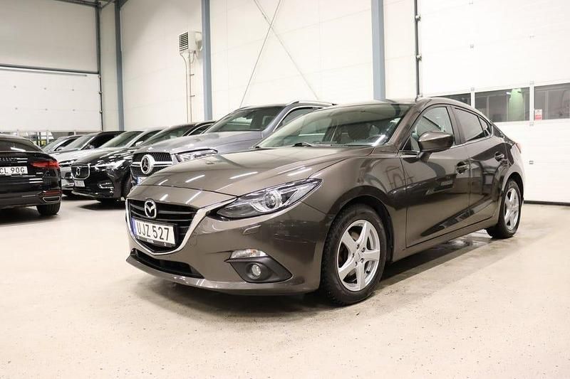 Brun Begagnad 2015 Mazda 3 Sedan | 149 900 kr (Marknadspris) - Bild 1/4