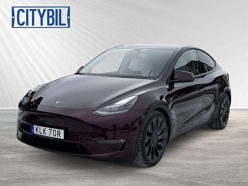 Röd Begagnad 2023 Tesla Model Y Performance SUV | 439 700 kr (Marknadspris) - Bild 1/4