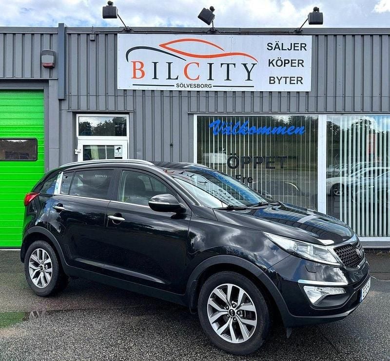 Svart Begagnad 2014 Kia Sportage Comfort SUV | 84 900 kr (Marknadspris) - Bild 1/4
