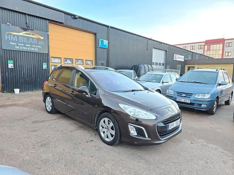 Begagnad Peugeot 308 SW 112 HK (82 kW) 2012 Brun Kombi