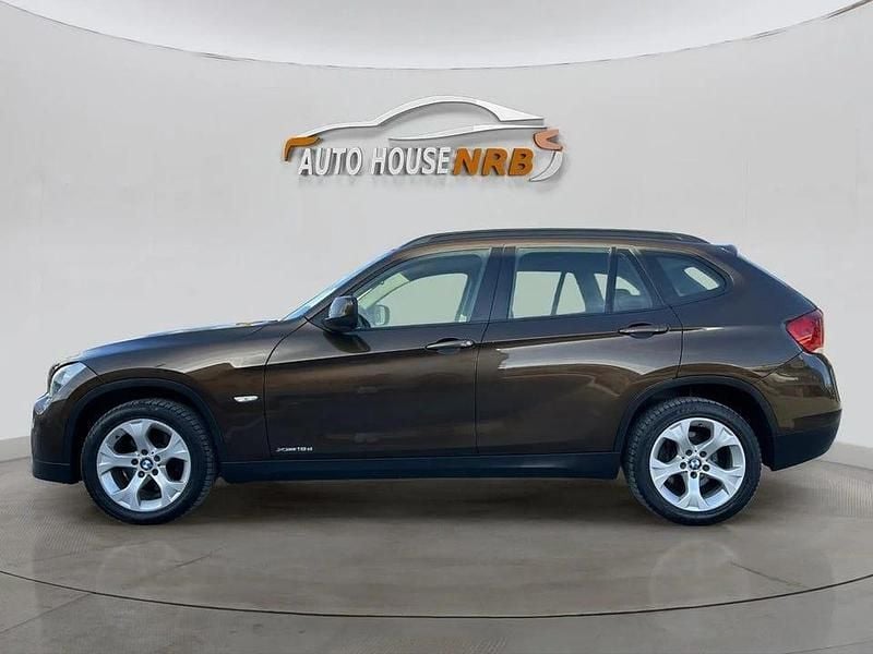 Brun Begagnad 2012 BMW X1 SUV | 109 500 kr (Marknadspris) - Bild 1/4