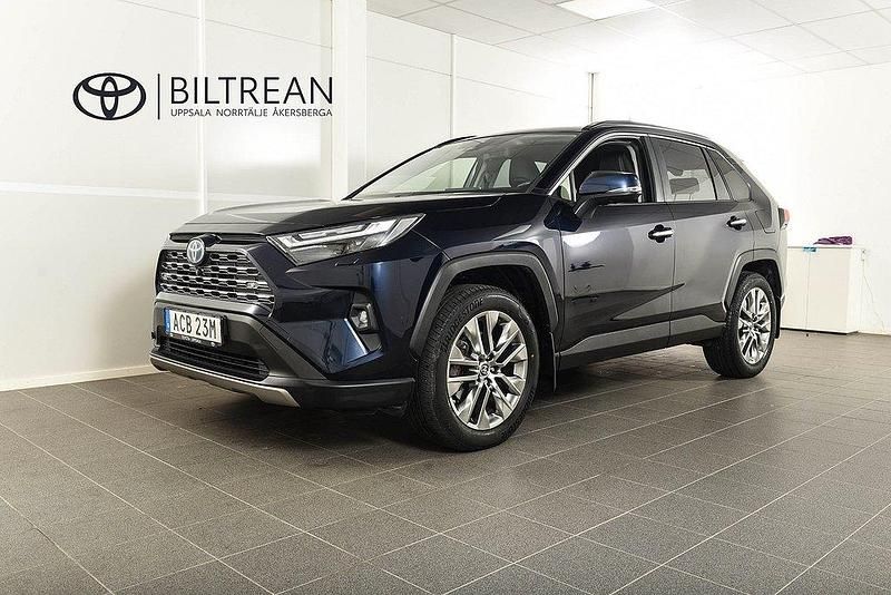 Mörkblå Begagnad 2021 Toyota RAV4 Hybrid Executive SUV | 384 900 kr (Lite dyr) - Bild 1/4