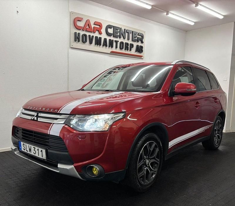 Mörkröd Begagnad 2014 Mitsubishi Outlander SUV | 99 000 kr (Marknadspris) - Bild 1/4