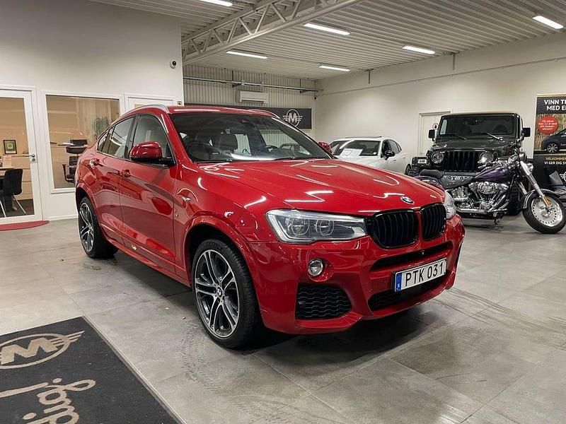 Röd Begagnad 2015 BMW X4 M Sport SUV | 234 900 kr (Marknadspris) - Bild 1/4
