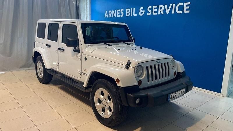 Vit Begagnad 2013 Jeep Wrangler Unlimited SUV | 229 900 kr (Superpris) - Bild 1/4