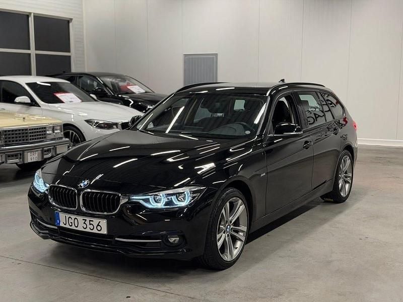 Begagnad BMW 330 Sport Line 252 HK (185 kW) 2018 Svart Kombi