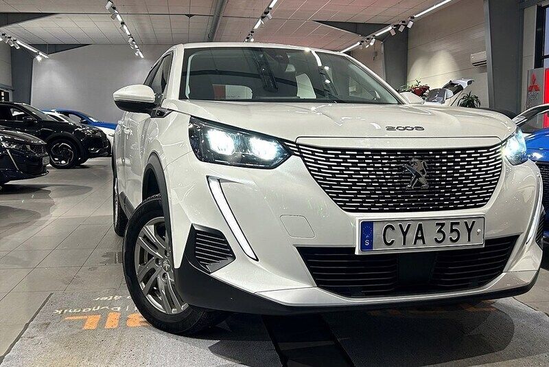 Vit Begagnad 2021 Peugeot e-2008 Active SUV | 194 900 kr (Marknadspris) - Bild 1/4