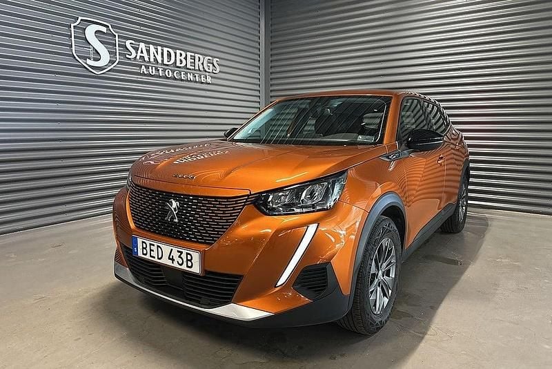 Begagnad Peugeot e-2008 Active 100 kW (136 HK) 2022 Orange SUV
