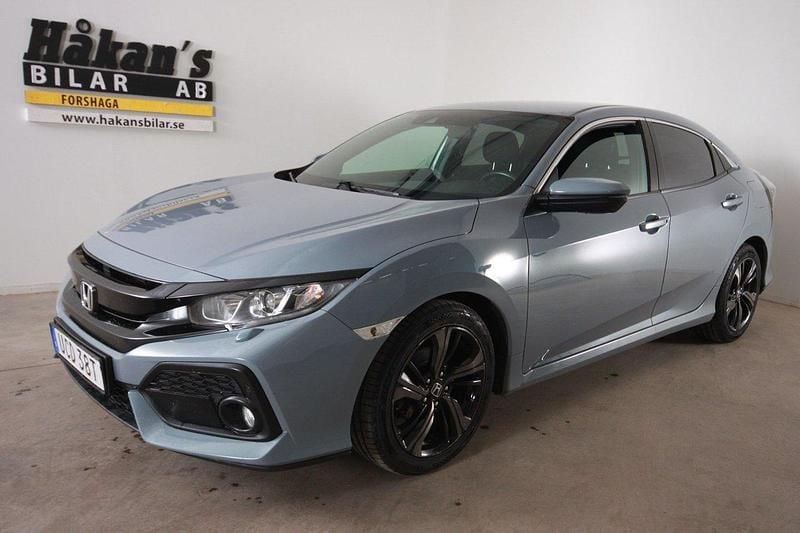 Mörkgrå Begagnad 2018 Honda Civic Elegance Halvkombi | 169 500 kr (Marknadspris) - Bild 1/4