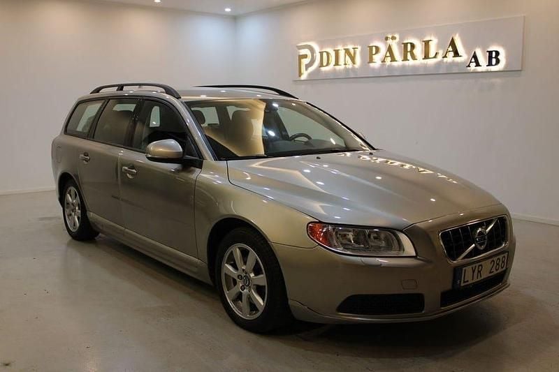 Ljusbrun (brun) Begagnad 2012 Volvo V70 Drive Kinetic Kombi | 79 900 kr (Marknadspris) - Bild 1/4