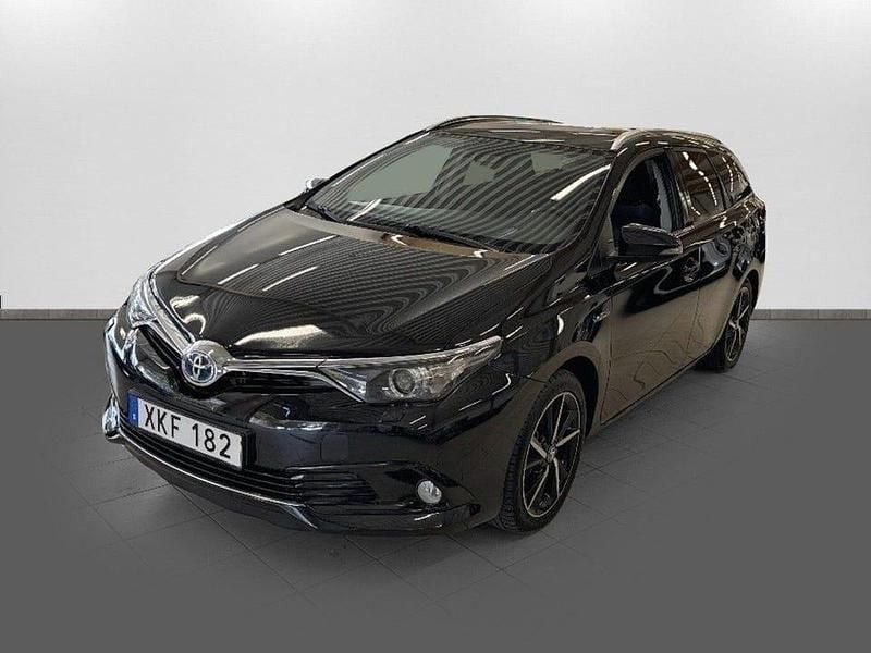 Svart Begagnad 2017 Toyota Auris Hybrid Kombi | 184 000 kr (Marknadspris) - Bild 1/4