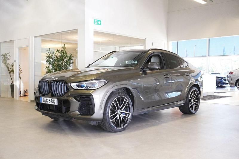 Ljusbrun Begagnad 2023 BMW X6 M50 Comfort Edition SUV | 919 800 kr - Bild 1/4