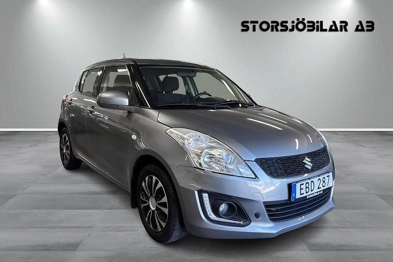 Mörkgrå Begagnad 2016 Suzuki Swift Halvkombi | 89 000 kr (Lite dyr) - Bild 1/4