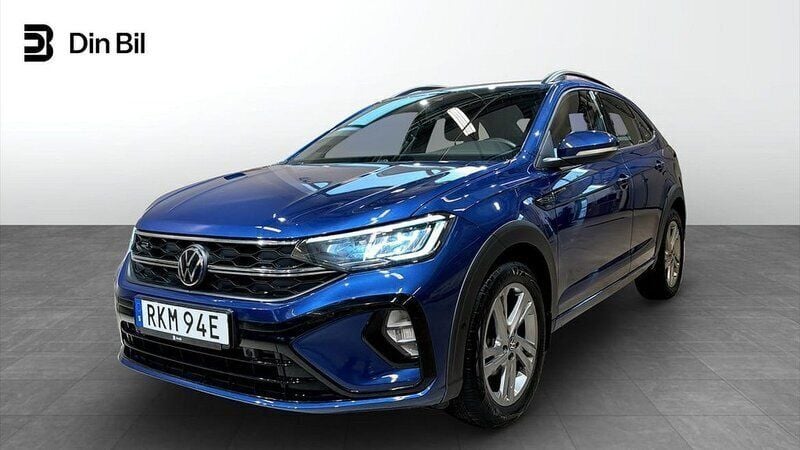Blå (reef blue metallic) Begagnad 2024 VW Taigo IQ Drive SUV | 259 900 kr (Marknadspris) - Bild 1/4