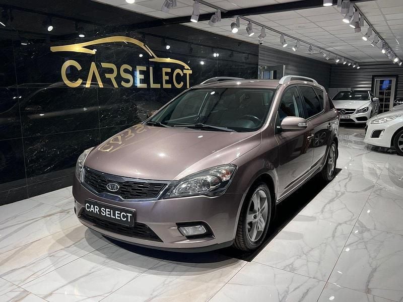 Mörkgrå (grå) Begagnad 2012 Kia Ceed Sportswagon Kombi | 59 900 kr (Bra pris) - Bild 1/4