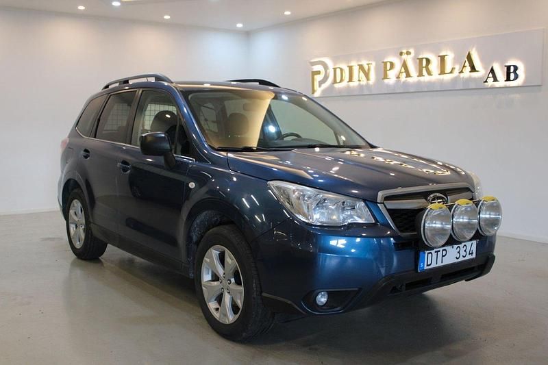 Mörkblå (blå) Begagnad 2013 Subaru Forester SUV | 69 900 kr (Bra pris) - Bild 1/4