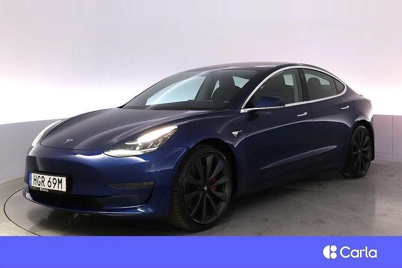 Blå Begagnad 2020 Tesla Model 3 Performance Sedan | 274 900 kr (Marknadspris) - Bild 1/4