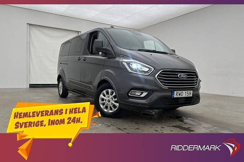 Grå Begagnad 2022 Ford Tourneo Custom Titanium Van | 424 800 kr (Marknadspris) - Bild 1/3