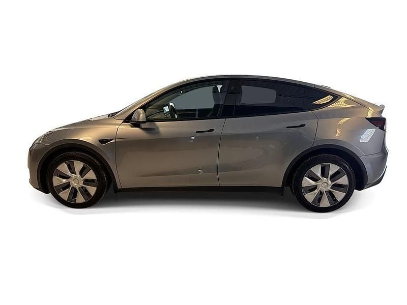 Begagnad Tesla Model Y Long Range AWD 378 kW (514 HK) 2023 Grå SUV