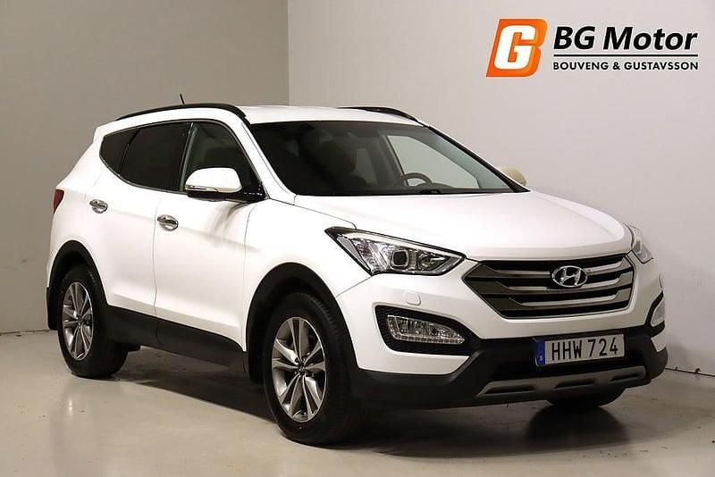 Vit Begagnad 2015 Hyundai Santa Fe Premium SUV | 174 700 kr (Marknadspris) - Bild 1/3