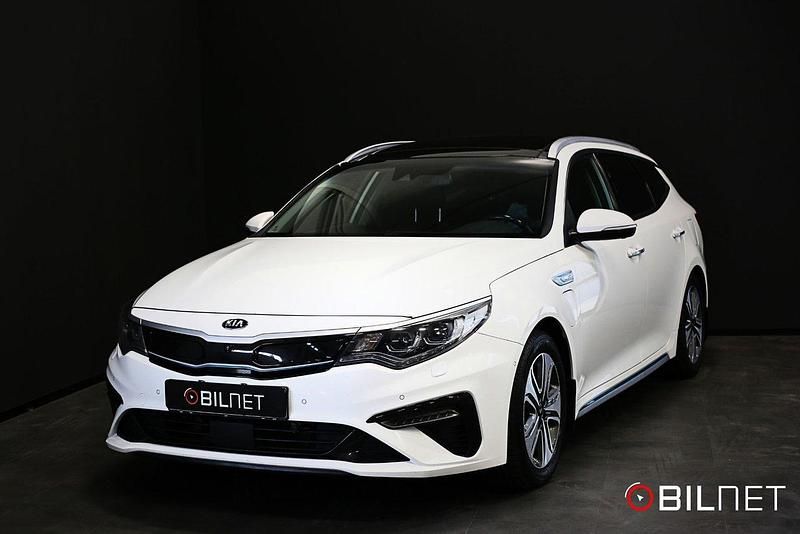 Vit Begagnad 2019 Kia Optima Hybrid Sport Sedan | 179 900 kr (Marknadspris) - Bild 1/4