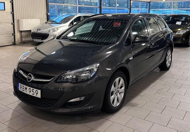 Grå Begagnad 2015 Opel Astra Enjoy Kombi | 59 900 kr (Marknadspris) - Bild 1/4