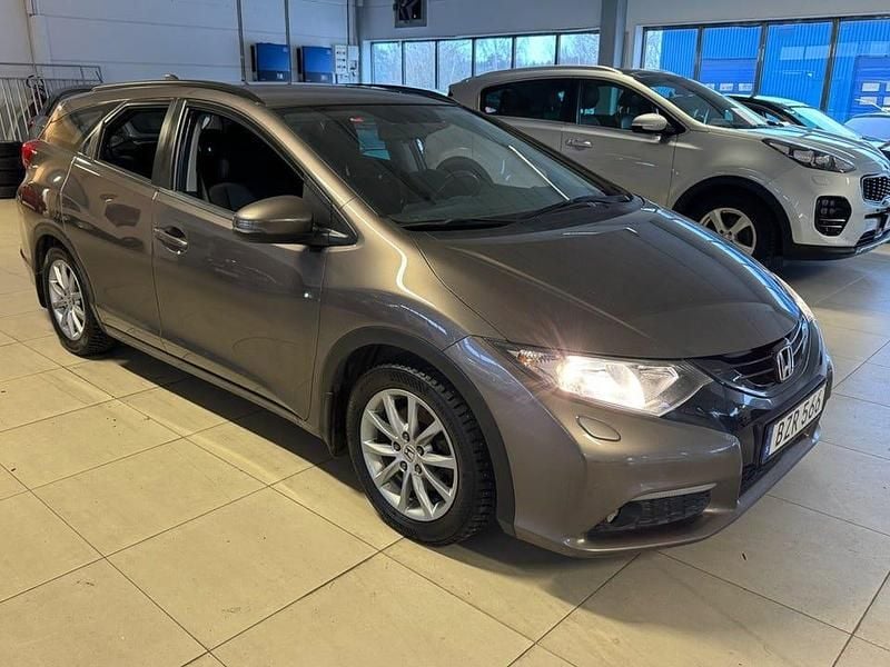Brun Begagnad 2014 Honda Civic Sport Kombi | 73 600 kr (Marknadspris) - Bild 1/4