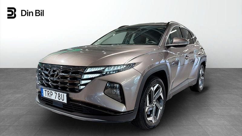 Brun Begagnad 2023 Hyundai Tucson SUV | 284 900 kr (Bra pris) - Bild 1/4