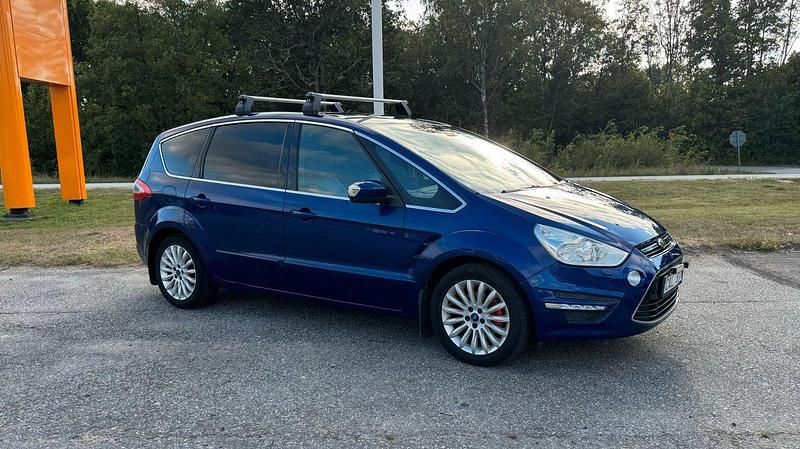 Blå Begagnad 2013 Ford S-MAX Business Edition Minibuss | 109 700 kr (Marknadspris) - Bild 1/4