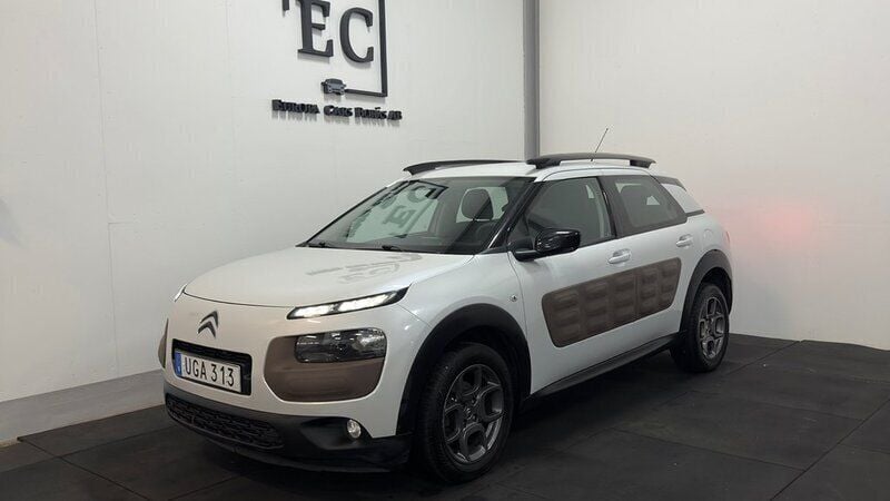 Vit Begagnad 2014 Citroën C4 Cactus PureTech Halvkombi | 69 900 kr (Marknadspris) - Bild 1/4