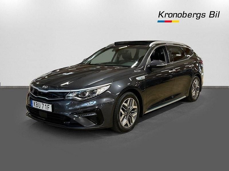 Grå metallic Begagnad 2019 Kia Optima Hybrid 2 Sedan | 189 500 kr (Marknadspris) - Bild 1/4