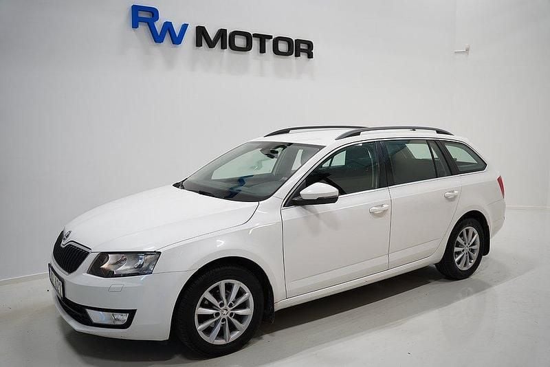 Vit Begagnad 2014 Skoda Octavia Ambition Kombi | 104 800 kr (Marknadspris) - Bild 1/4