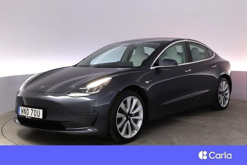 Grå Begagnad 2019 Tesla Model 3 Long Range AWD Sedan | 282 900 kr (Marknadspris) - Bild 1/4