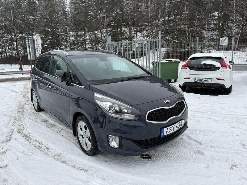 Begagnad Kia Carens 136 HK (100 kW) 2014 Blå Minibuss