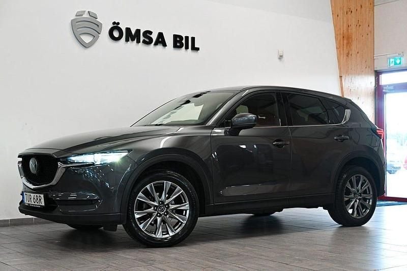 Grå Begagnad 2020 Mazda CX-5 Optimum SUV | 238 800 kr (Marknadspris) - Bild 1/4