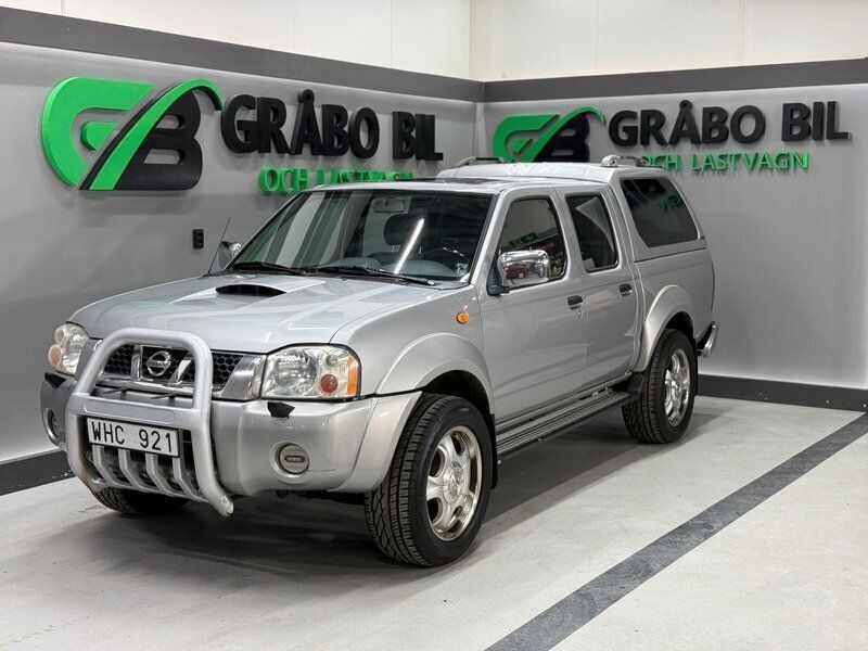 Silver Begagnad 2004 Nissan Navara Pickup | 129 900 kr - Bild 1/4