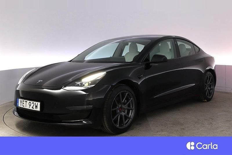 Svart Begagnad 2021 Tesla Model 3 Long Range AWD Sedan | 298 900 kr (Marknadspris) - Bild 1/4