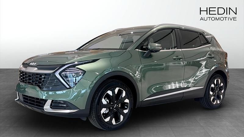 Grön (green) Ny 2025 Kia Sportage Advance SUV | 469 475 kr (Marknadspris) - Bild 1/4