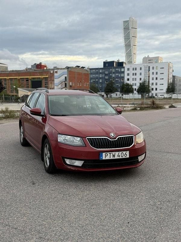 Röd Begagnad 2014 Skoda Octavia Ambition Kombi | 37 990 kr - Bild 1/4